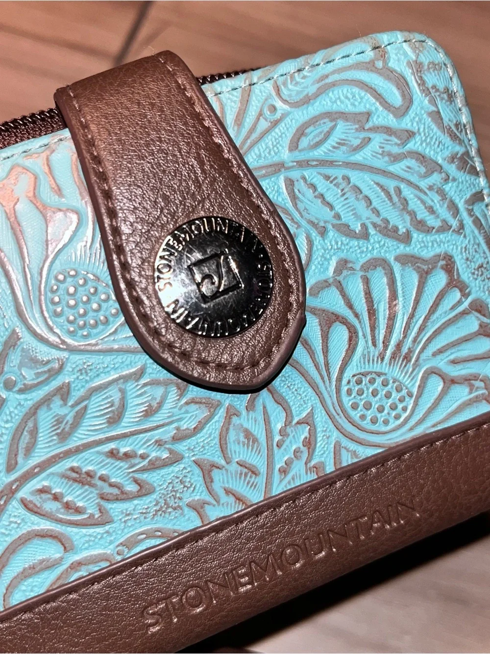 Stone Mountain Accessories Turquoise and Brown Embossed Floral Wristlet Wallet